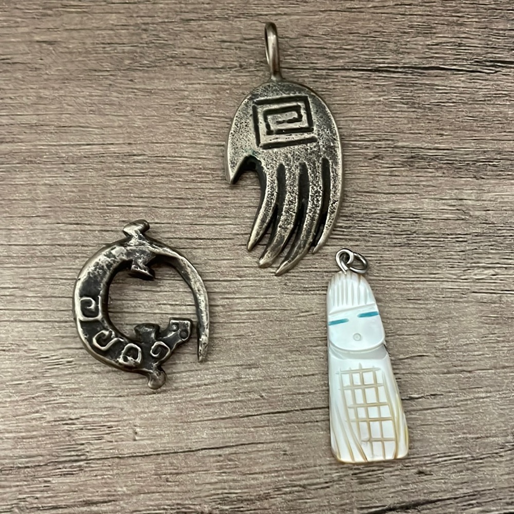 3 pendants two are sterling silver